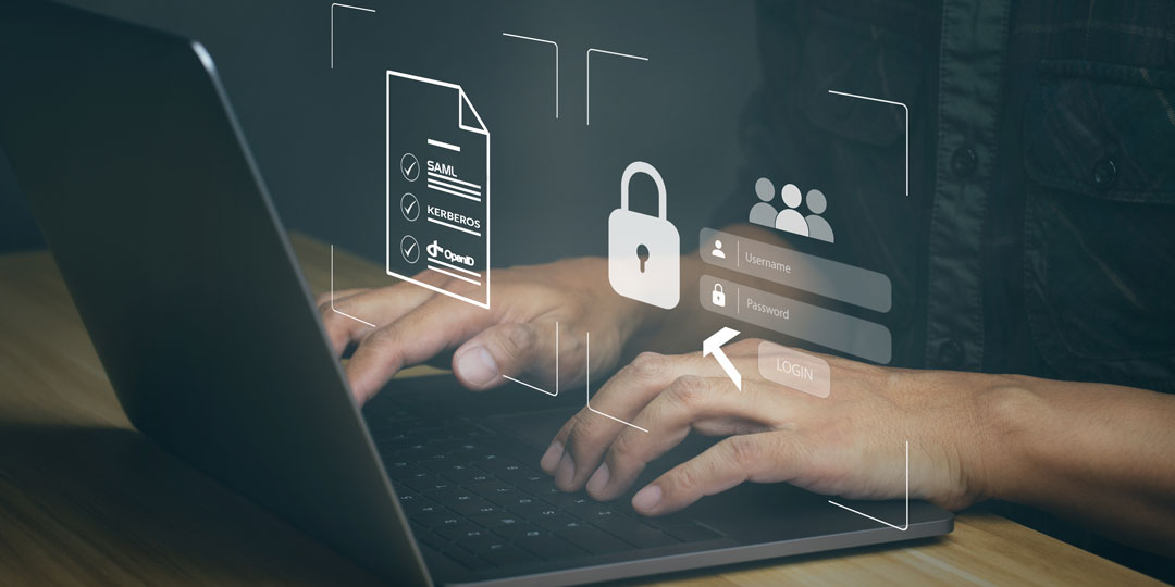 Male hands on laptop login user authentication system SAML, Kerberos and OIDC